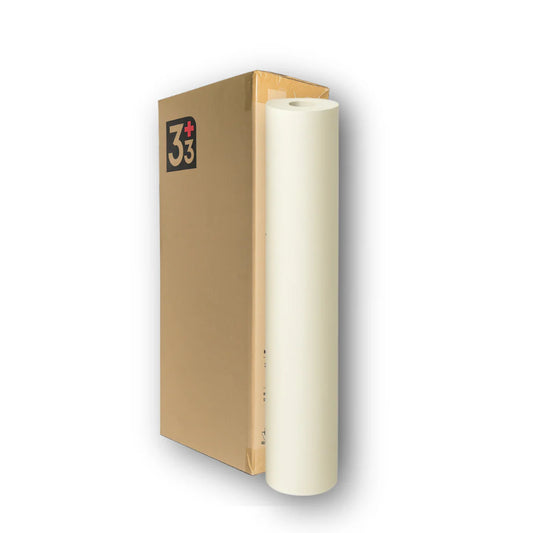 24-inch white medical exam table paper roll standing upright next to its tall brown cardboard box with 3+3 branding on a white background.