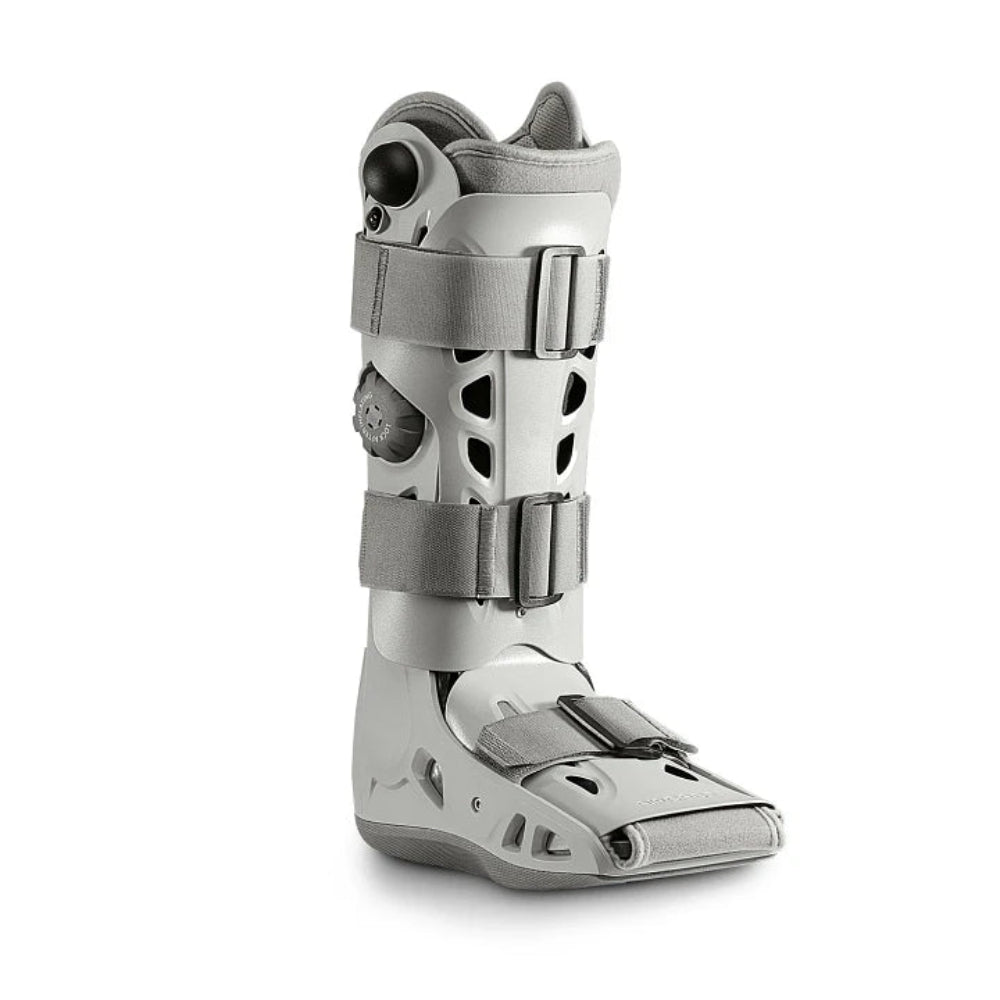 A direct side profile of the Elite walking boot, showcasing the sleek, semi-rigid shell and the integrated inflation dial system.