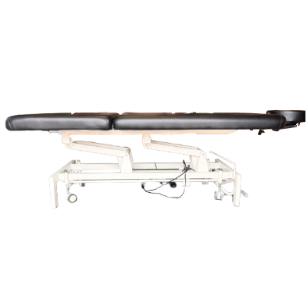 Direct side profile view of the black 2-section electric height control facial massage treatment table laid completely flat on a white background.