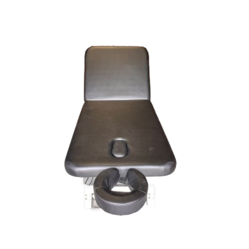 Close-up view of the adjustable headrest section with an attached face cradle and face cutout on the 2-section electric treatment table.