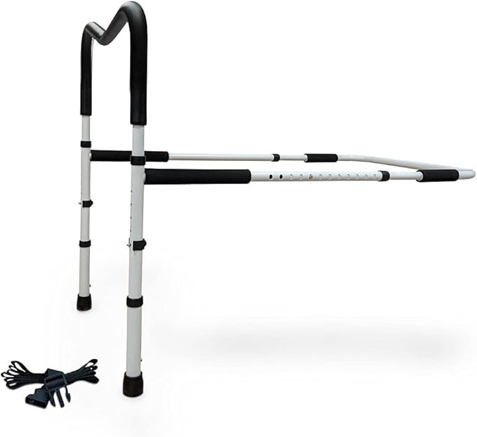 White Avantia adjustable bedside rail assist handle featuring floor-standing support legs, foam handgrip, and safety strap on a white background.