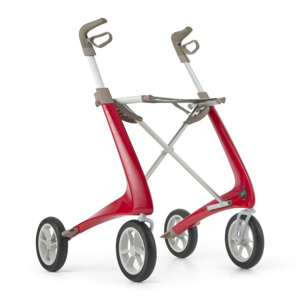 Standalone angled view of the strawberry red Carbon Ultralight Compact rollator, featuring a minimalist carbon fiber frame, forward-facing ergonomic handles, and a lightweight 10.6 lb build for effortless travel.