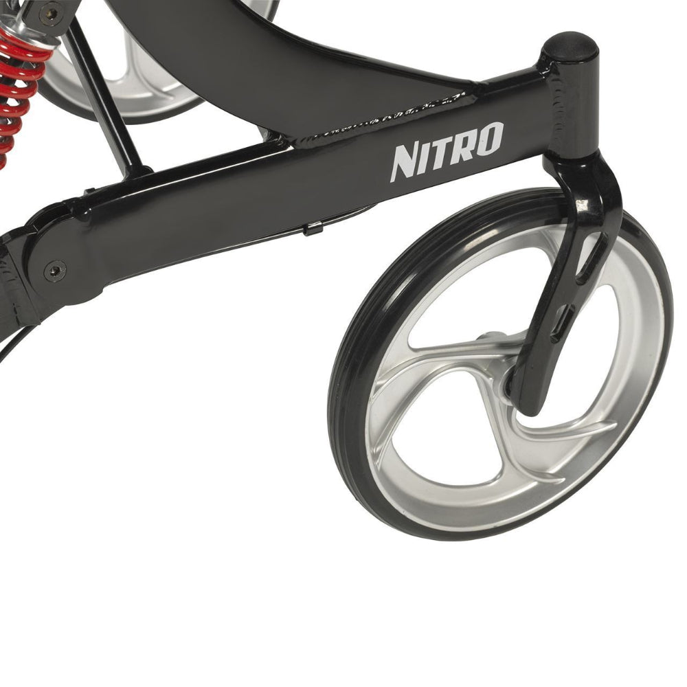 Close-up view of the Drive Nitro rollator's large 10-inch front casters and caster fork design, engineered for optimal steering and rolling comfort on various surfaces.