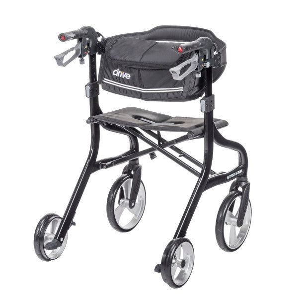 Three-quarter angle view of a black Drive Nitro Sprint rollator walker with front storage bag and seat on a plain white background.
