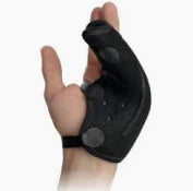 Black Enovis hand based ulnar gutter brace worn on a person's hand against a white background