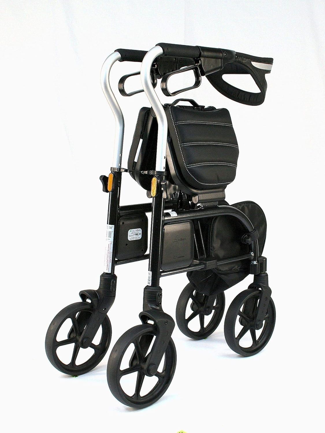 The Trillium rollator in its folded state, demonstrating the ultra-slim cross-folding frame that stands independently for easy storage.