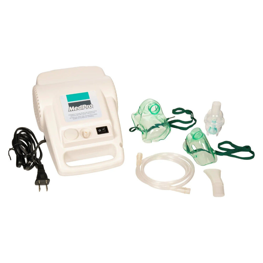 An overview shot of the complete MedPro kit, including the compressor unit, tubing, medicine chamber, and replacement filters.