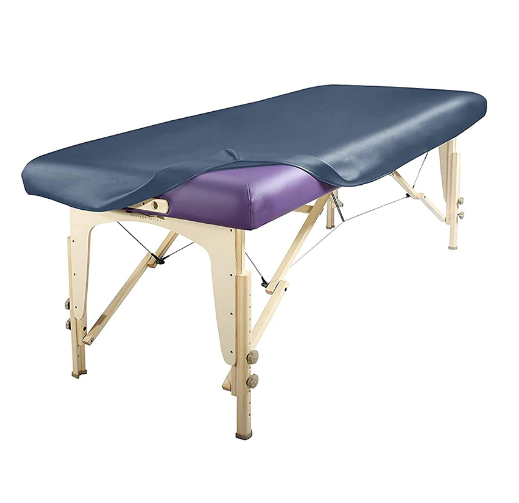 Navy blue fitted PU vinyl protective cover fitted over a wooden massage table