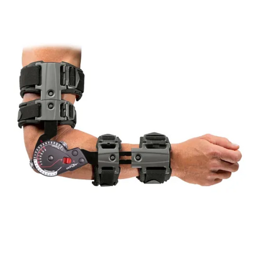 Black adjustable ROM hinged post-operative elbow brace worn on a person's arm showing dial hinge and secure straps against a white background.