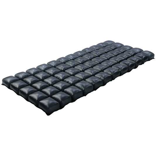 ROHO Prodigy non-powered air-filled mattress overlay system with interconnected air cells for pressure injury prevention on a transparent background.