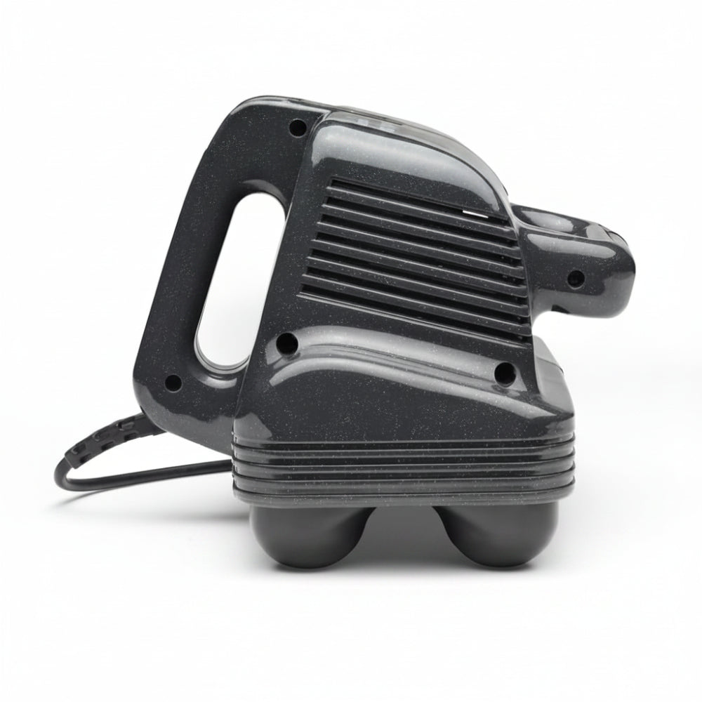 Side view of the Thumper Maxi Pro highlighting the ergonomic handle grip and the robust housing for the professional-grade motor.