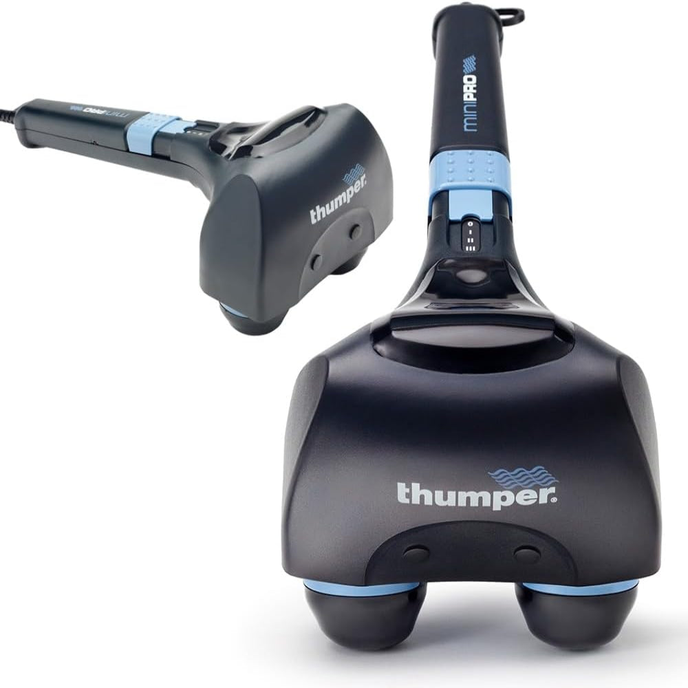 Direct front view of the Thumper Mini Pro, highlighting the dual-head design and the professional-grade construction.