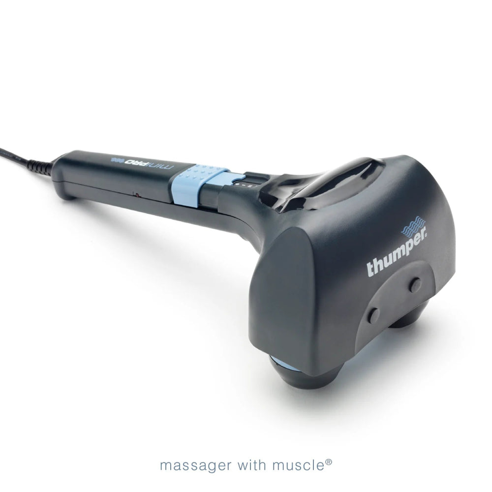 A top-angle shot of the massager standing upright, showing the power cord and the ergonomic grip.