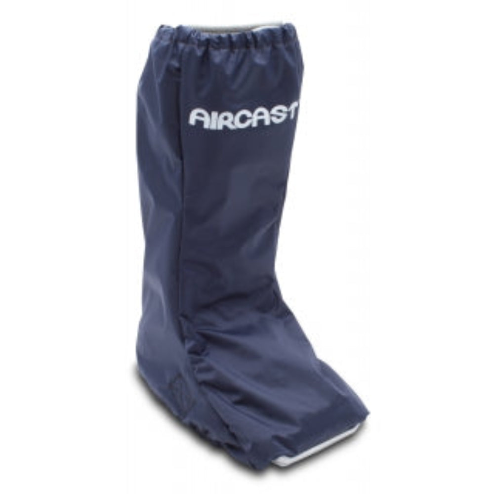 Load video: Aircast Walking Brace Weather Cover demonstration showing how to slip the waterproof cover over an Aircast walking boot, secure the back Velcro closures, and keep the open bottom exposed for traction outdoors.