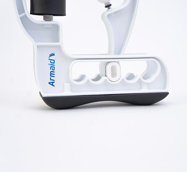 Detailed view of the Armaid's ergonomic support base and leg strap, which allows for stable, hands-free operation during intensive forearm therapy sessions.