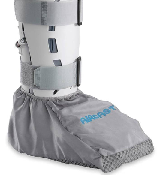 A protective grey hygiene cover fitted over an Aircast walking boot, designed to prevent the tracking of dirt, dust, and germs into the home or clinical environment.