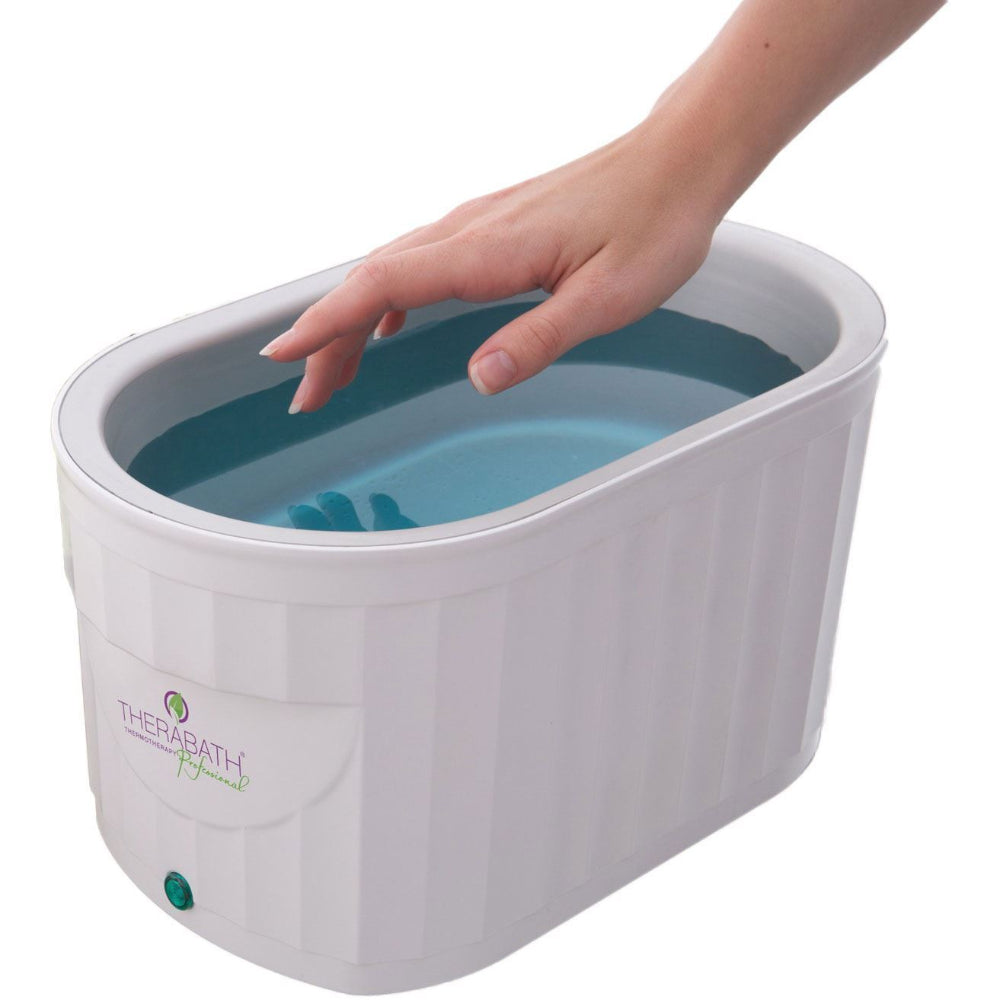 A top-down view of the Therabath Pro in use, highlighting the large tank capacity that comfortably accommodates hands and feet for clinical or home treatments.
