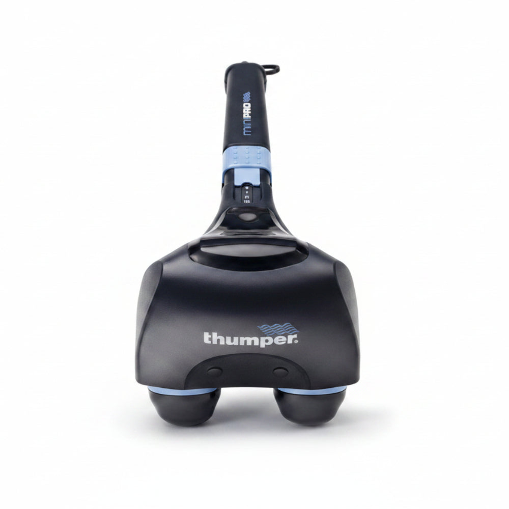 A front angled view of the Thumper Mini Pro deep tissue massager, featuring its signature dual-head design and ergonomic handle for professional-grade muscle therapy.